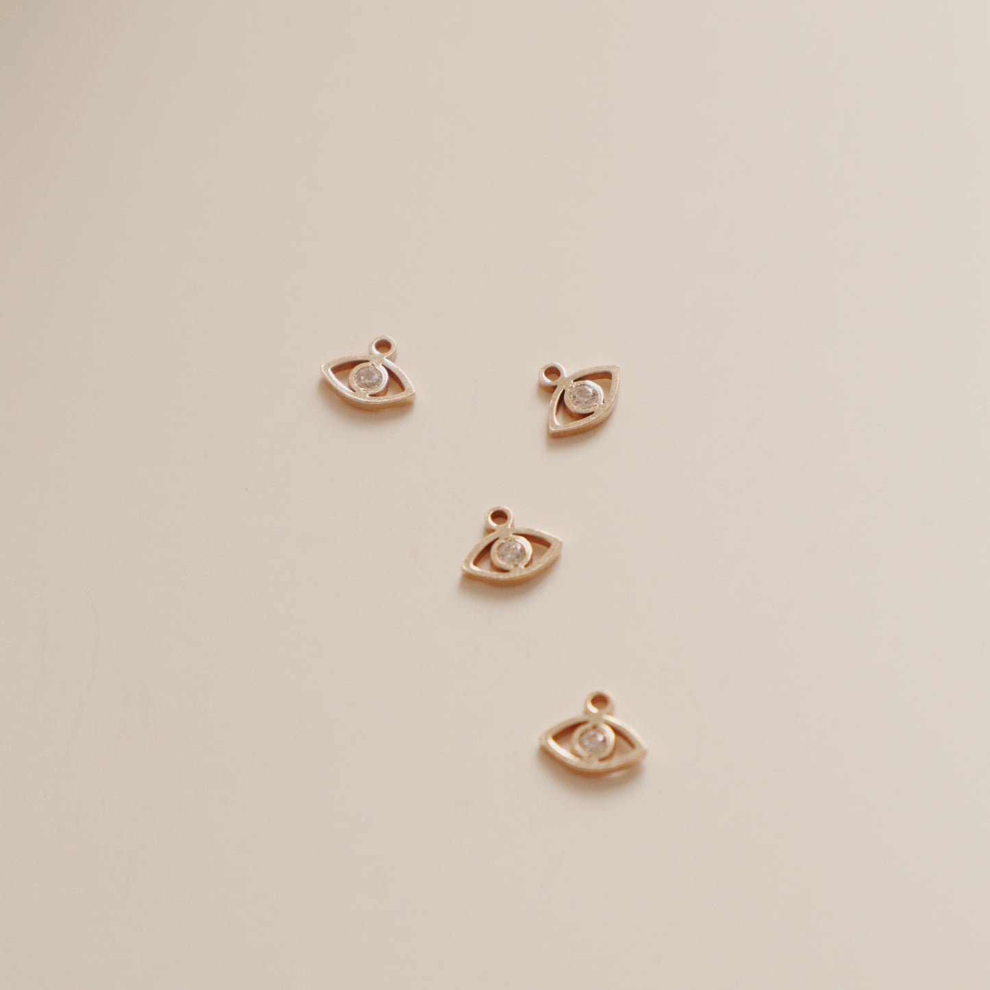 Zircon Eye Charm
