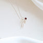 Bow and Garnet Necklace PeacePiecesJewelry